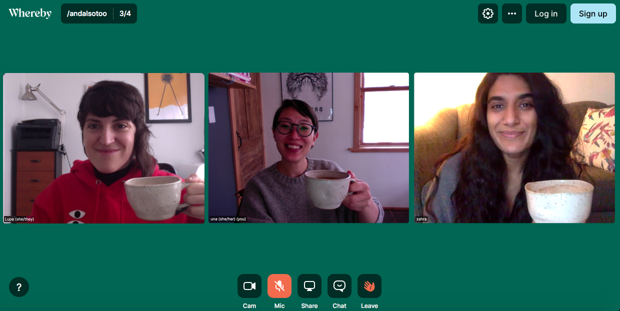 Screenshot of The And Also Too team in a green video conference room. Lupe (left), Una (center) and Zahra (right) smile and hold tea mugs to the camera.